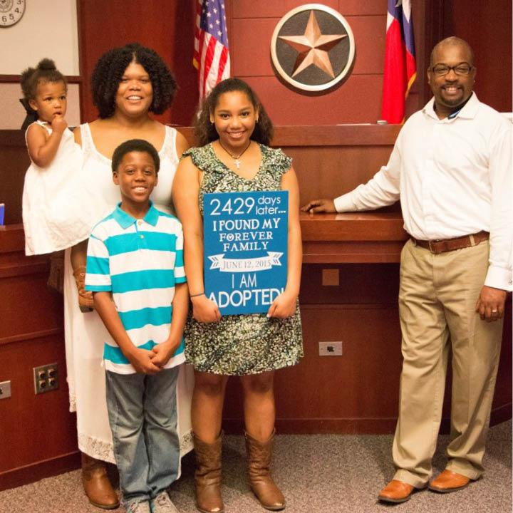 Family in adoption courtroom