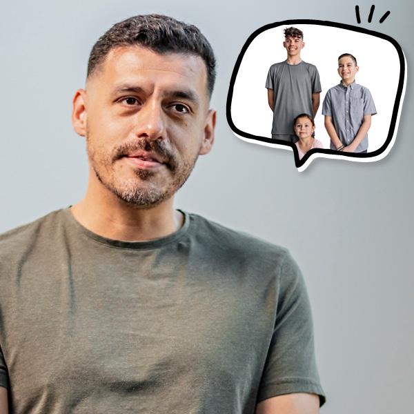 A man in a gray t-shirt looks thoughtful, with a speech bubble next to him showing his three children.